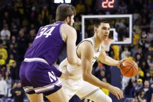 Read more about the article No. 20 Michigan fends off Northwestern in OT