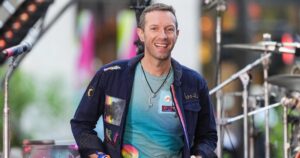 Read more about the article Chris Martin and Dakota Johnson Visit Temple in India, Squash Rumors