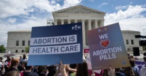 Read more about the article Red states are testing their power to restrict abortion nationwide