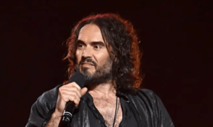 Read more about the article Russell Brand Sued Over Sexual Abuse Allegations  In UK Court